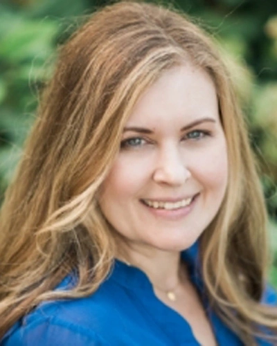 Headshot of Adrienne Adams.