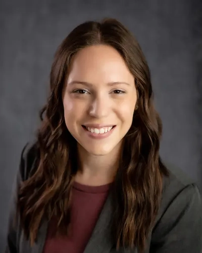 Portrait of a smiling Rachel Hollander.