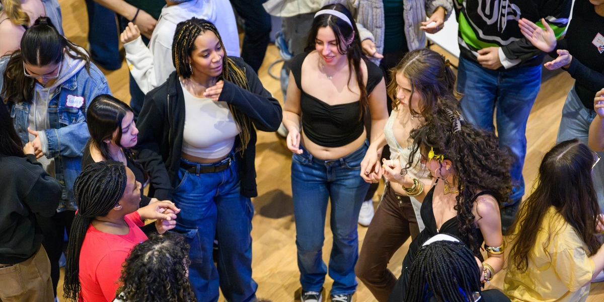 women standing in a circle