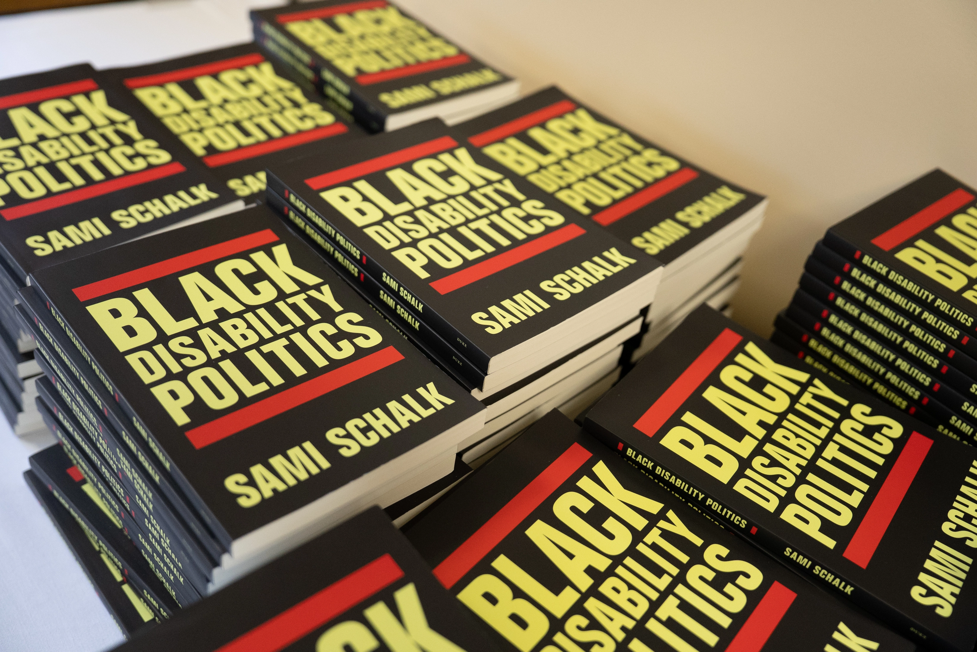 A stack of Sami Schalk's book, "Black Disability Politics", to be given away to attendees at the Disability Summit.
