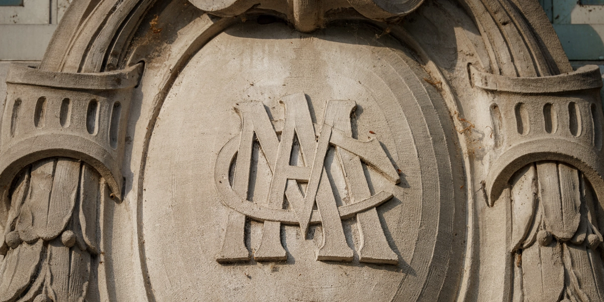 The MAC carving on the entrance of the IM Circle building