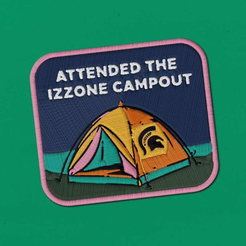 Embroidered patch reading "Attended the Izzone Campout" with a tent that includes a Spartan helmet on a green background.