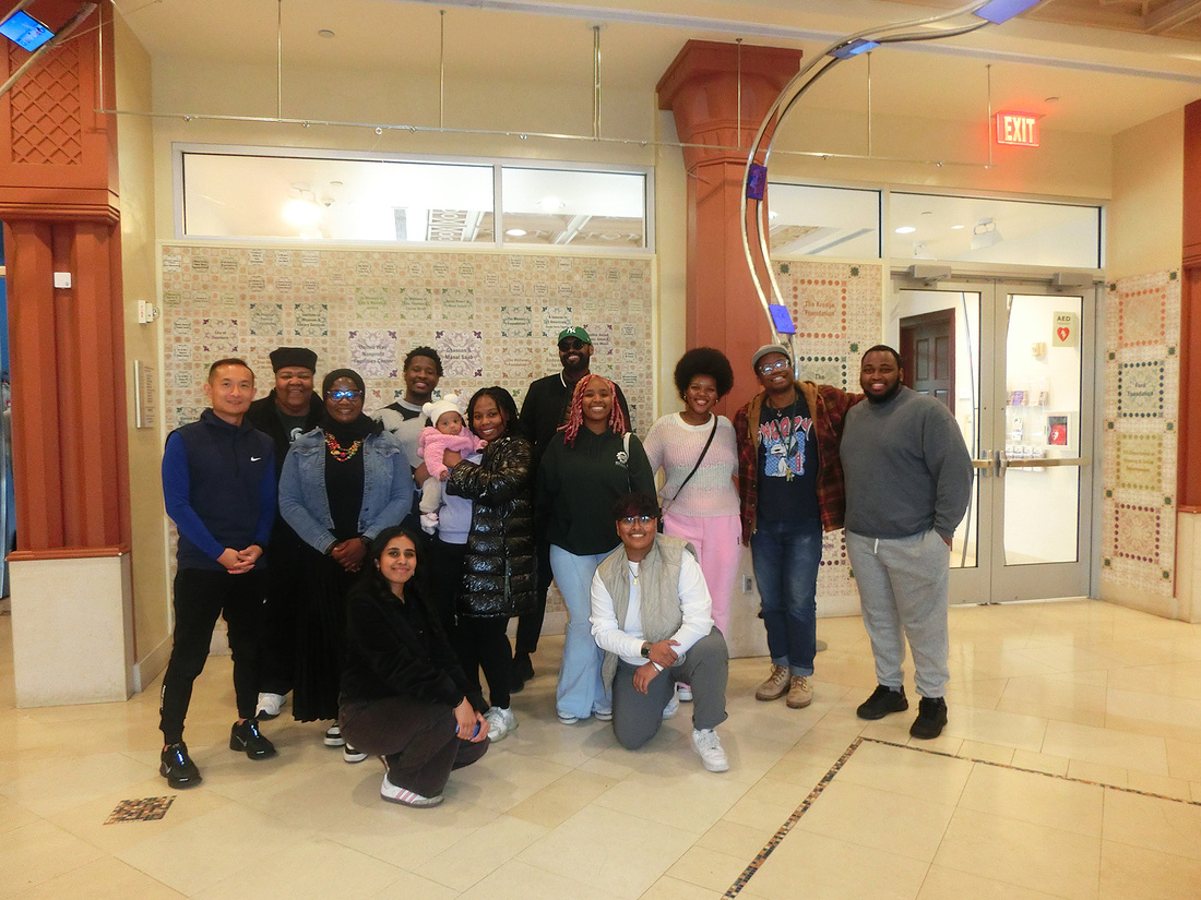 A group of people inside a museum