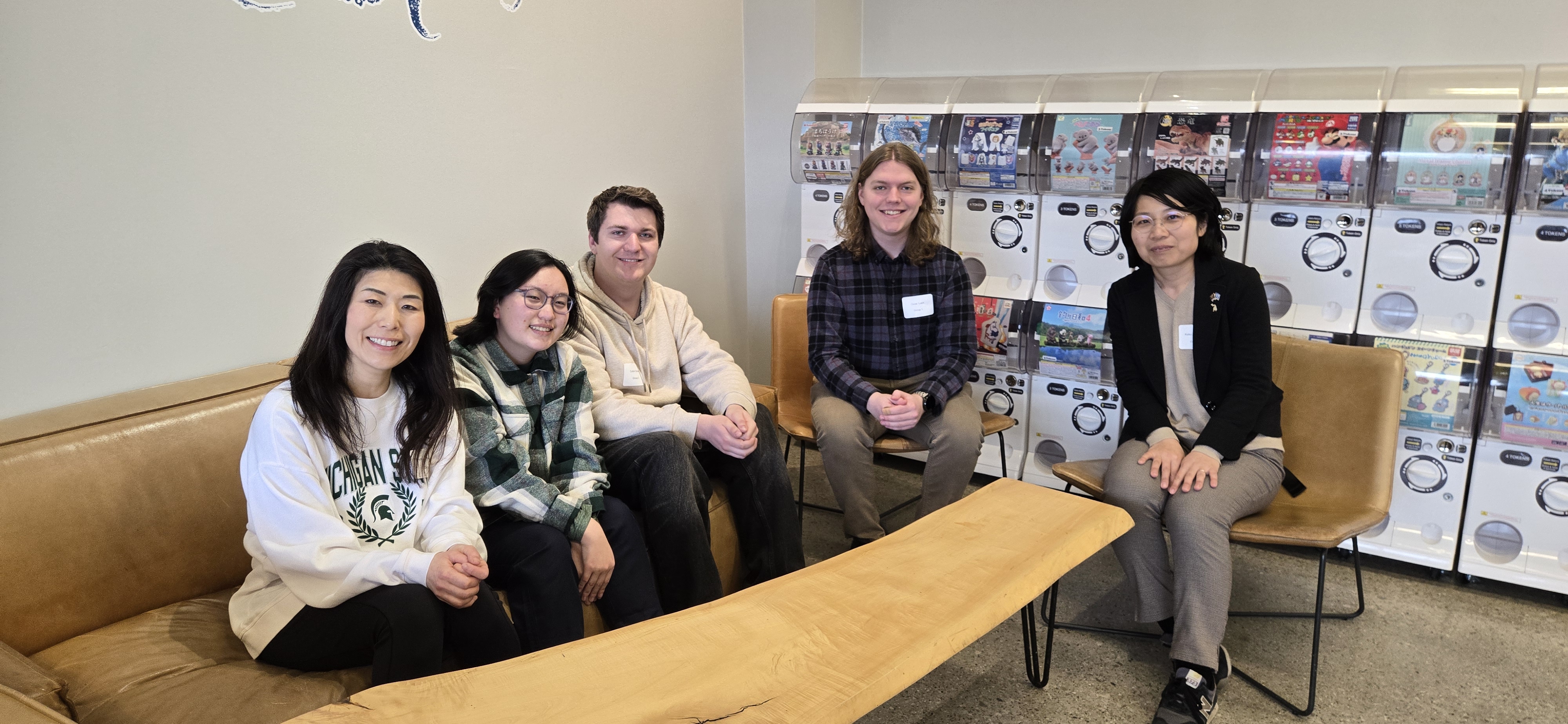 a group of people in a lounge