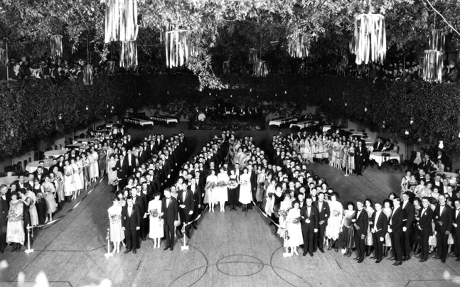 Students spell out M.A.C. during the Grand March of the 1922 J-Hop (Junior Hop).