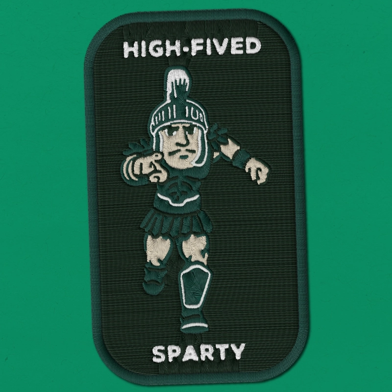 Embroidered patch showing Sparty mascot with text HIGH-FIVED SPARTY on green background.