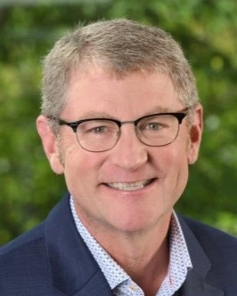 A portrait of a smiling Jason Rowntree.