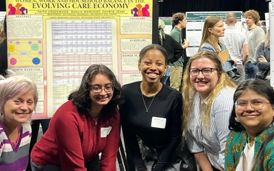 Nahlia Moncrief posing with JMC Profs. Louise Jezierski and Sejuti Das Gupta and fellow Madison students Saumya Johri and Faith Greenwood during the University Undergraduate Research and Arts Forum (UURAF).