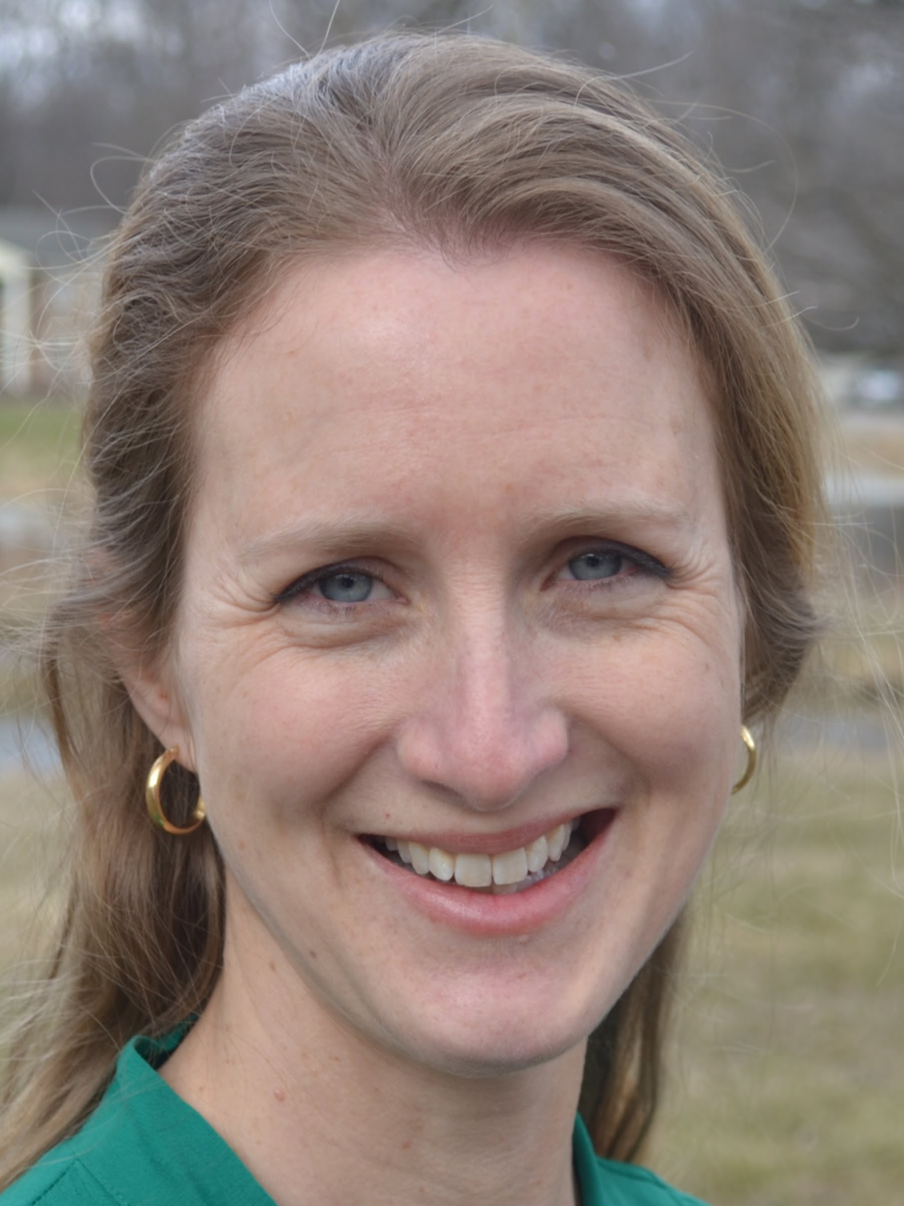 A woman smiling