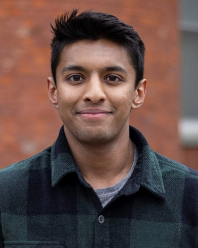 Portrait of a smiling Aaron Philip.