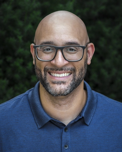 Headshot of Louis Moore.