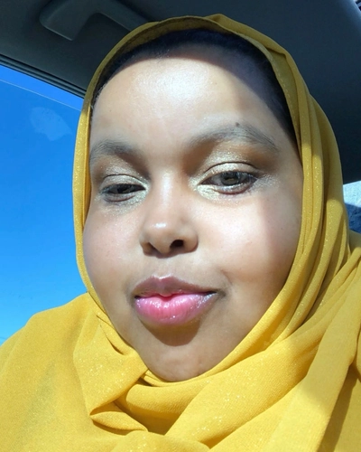 Aisha Shackelford smiles in a selfie.