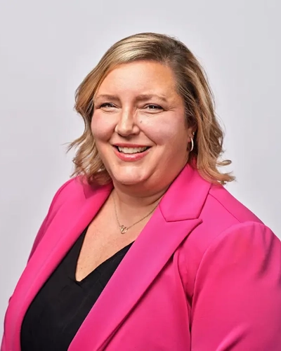 Portrait of a smiling Venessa Keesler.