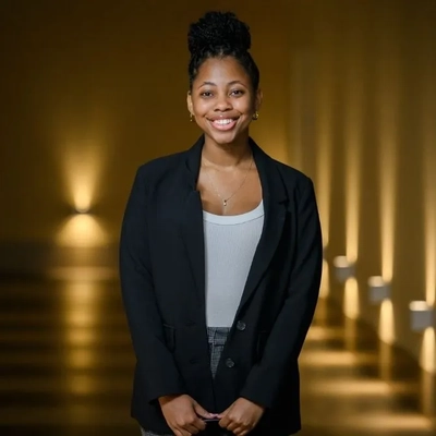 A portrait of a smiling Nahlia Moncrief.