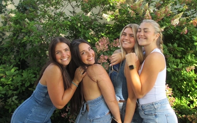 Samantha Santoliquido smiling with her friends.