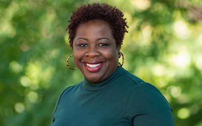 Headshot of Sheneka Williams.