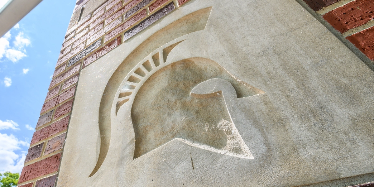 Spartan Helmet relief engraved on the entrance gates to Spartan Stadium