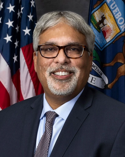 A portrait of Senator Sam Singh.