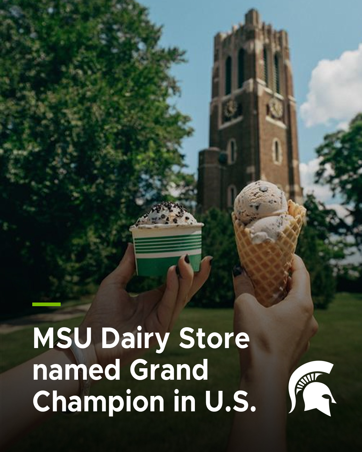 two hands holding ice cream in a cone and in a cup in front of Beaumont clock tower with trees in the background and a white Spartan helmet in the upper right corner
