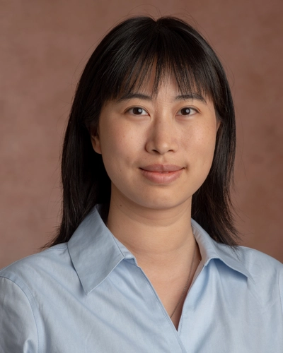 A portrait Yu Zhang, assistant professor in the Department of Microbiology, Genetics.