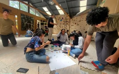 Students from Detroit and Costa Rica creating artwork together