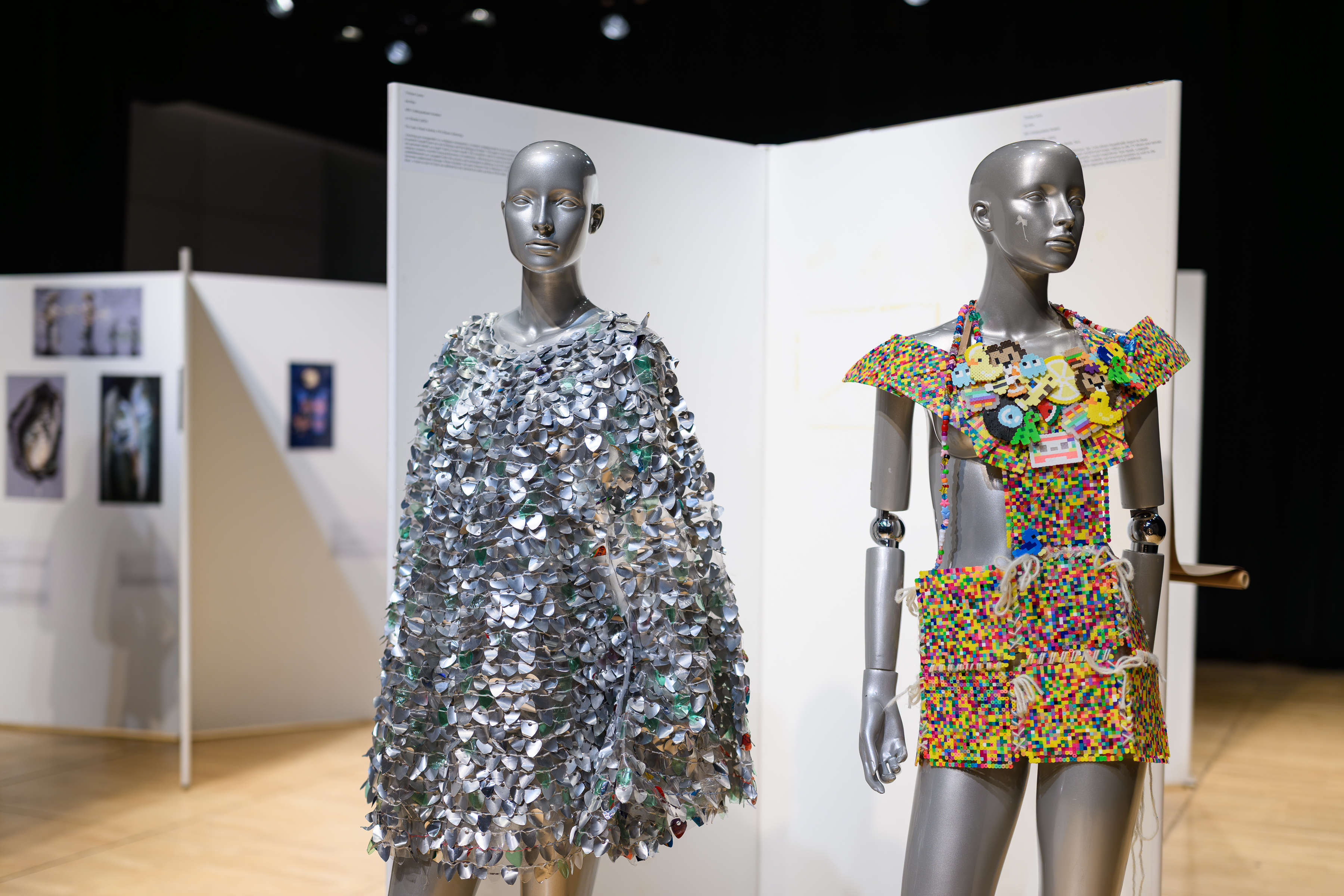 Two mannequins dressed in sparkling fashion