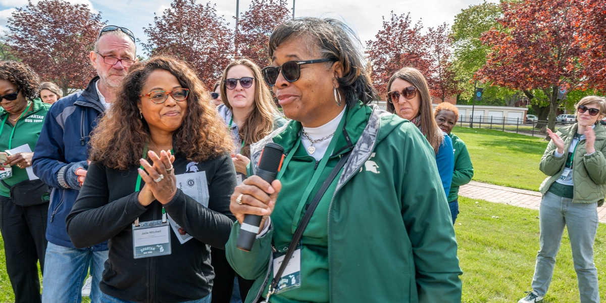 MSU faculty member Jeneen Hinkle speaks into a microphone
