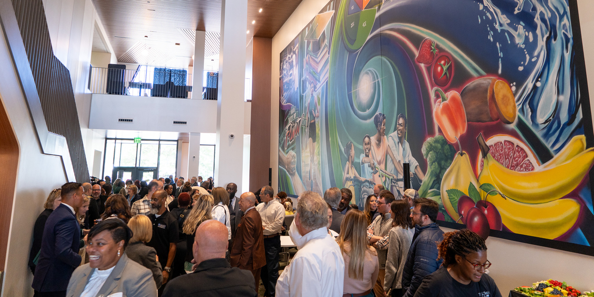 More than 100 attendees celebrated the ribbon-cutting ceremony for the MSU College of Human Medicine’s Flint expansion. Photo courtesy of Josh Kennedy, MSU College of Human Medicine.