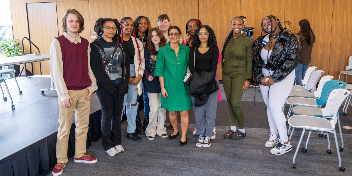 Dr. Mona Hanna meets with students at the Gloria Coles Flint Public Library to discuss her book, work, and answer questions. “What the Eyes Don’t See” was the library’ book club selection for the 10-year recognition of the water switch. Photo by Josh Kennedy