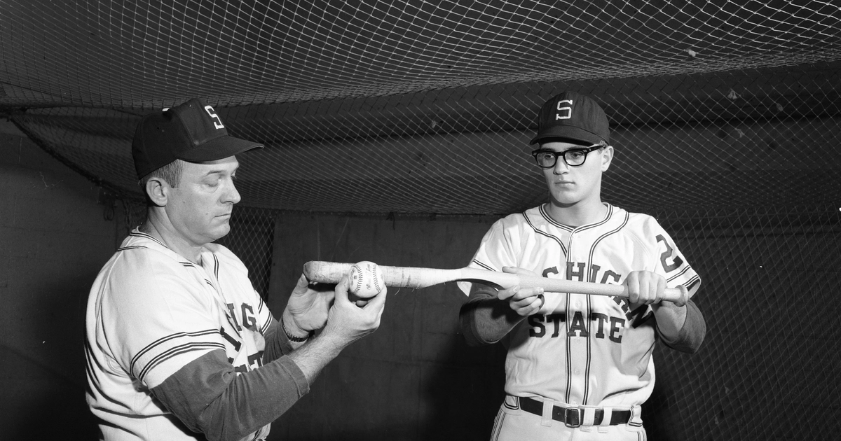 Coach Danny Litwhiler shows his Bunting Bat to an MSU Baseball player.