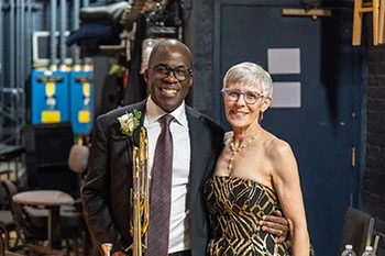 Kenneth Thompkins backstage with his spouse, Jana Thompkins