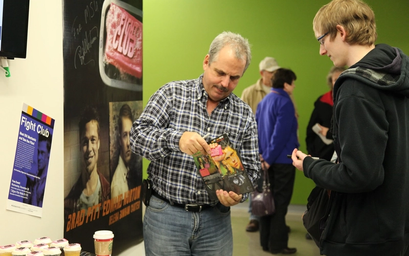 Bill Mechanic speaks with a student at an event at Michigan State University in 2012 during a screening of Fight Club.
