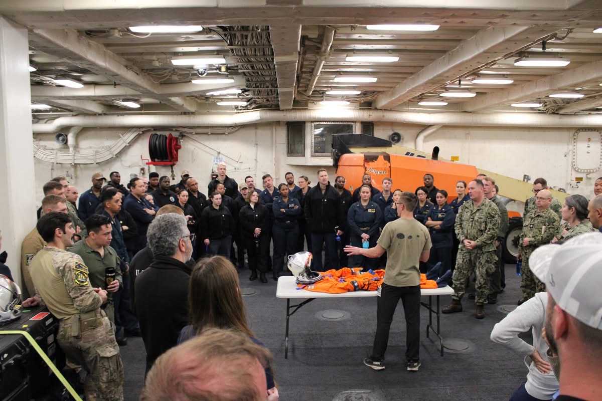 NASA engineer Nicholas Houghton leads a briefing about the Orion Crew Survival Systems.