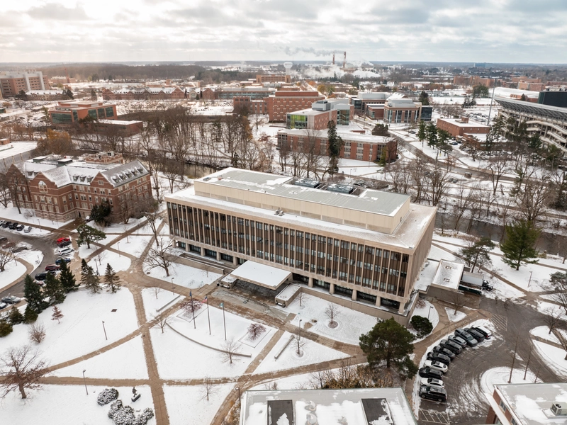 Aerial view of the John A Hannah Administration building in winter.