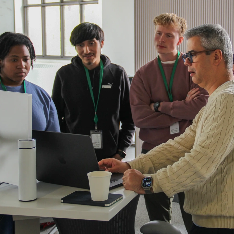 Students learning and collaborating on artificial intelligence technology.