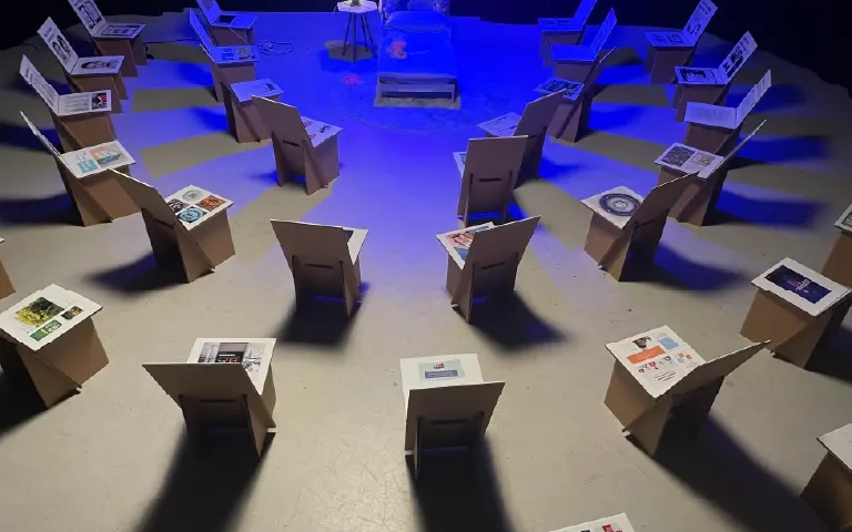 Chairs facing the center with information on every one about child sexual abuse