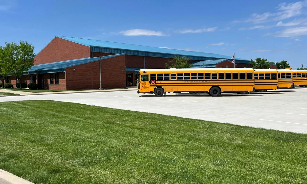 Bus in front of a school