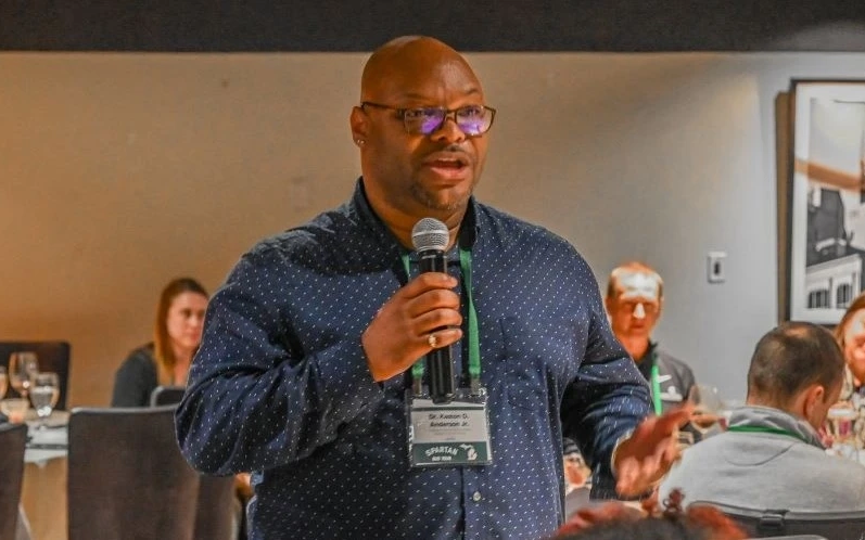 Kaston Anderson Jr. speaking at an event