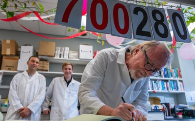 Jeff Barrick, Devin Lake and Richard Lenski in the lab