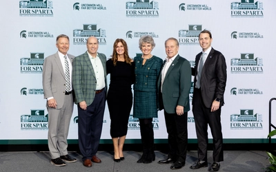 This is a picture of President Guskiewicz, Greg and Dawn Williams, Vice President of University Advancement Kim Tobin, MSU men's basketball coach Tom Izzo and MSU Director of Intercollegiate Athletics J Batt pictured at the Greg and Dawn Williams Commitment ceremony.