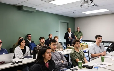 Students at a visit from members of the MSU Green and White Council