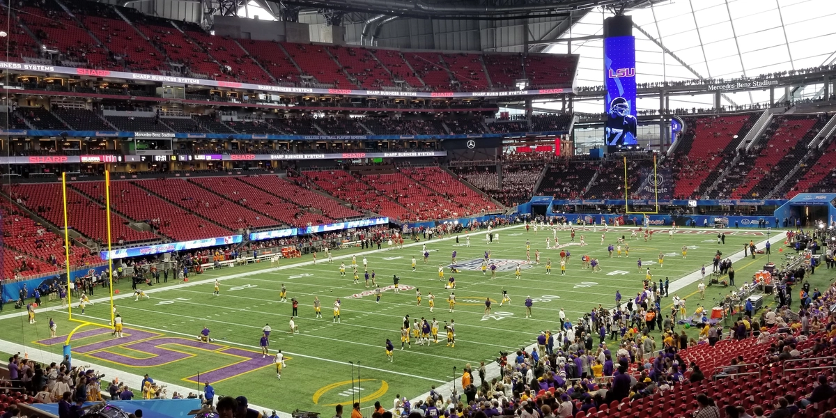 Temporary natural-grass field installation at Mercedes-Benz Stadium for FIFA World Cup 2026