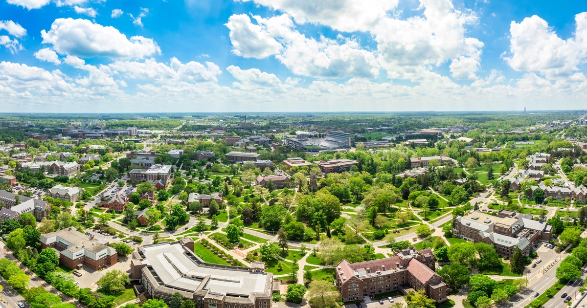 A south-facing panoramic aerial view of MSU campus.