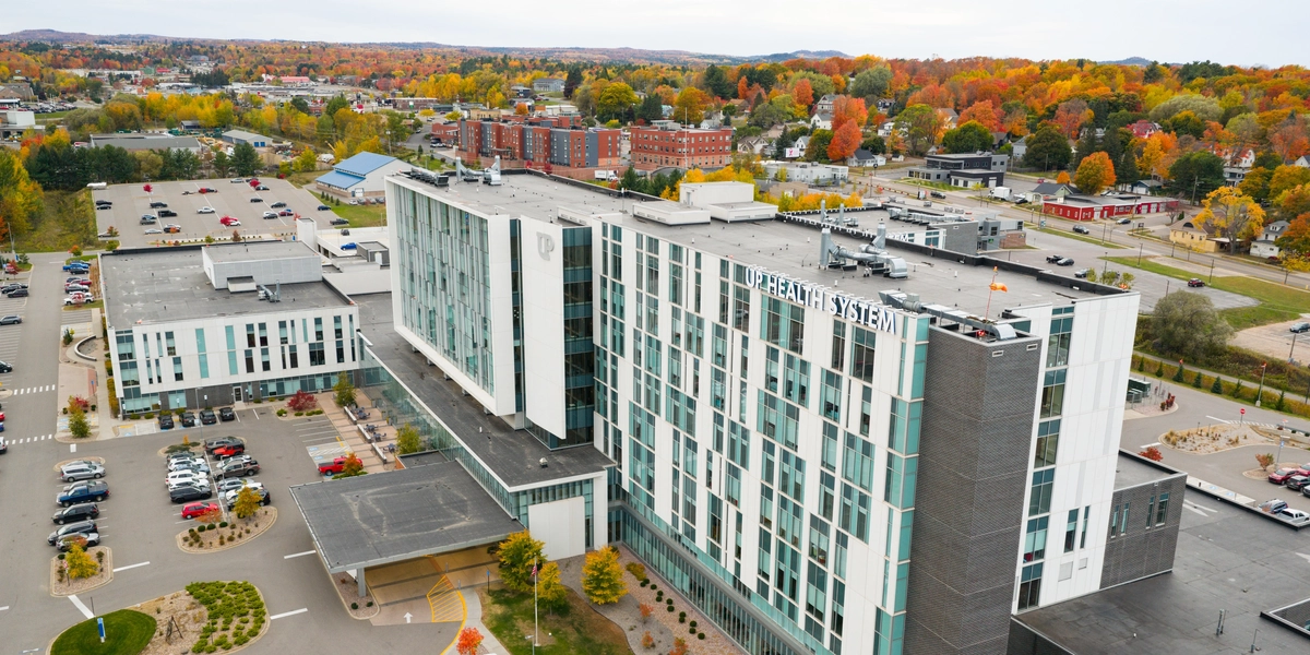 An aerial photo of the UP Health System Marquette Campus during fall.