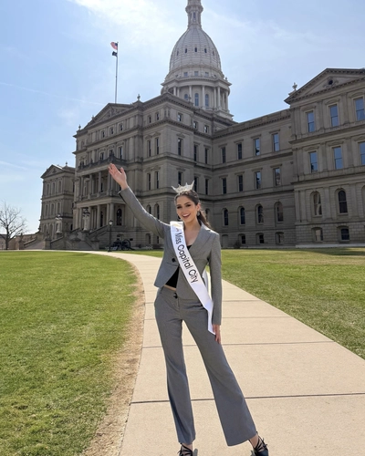Madison Nero in front of the Capitol building in her sash.