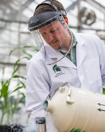 Berkley Walker covers leaves with liquid nitrogen