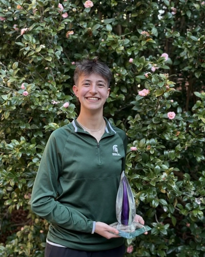 Joanna Gusis with the Julia Burke Award.