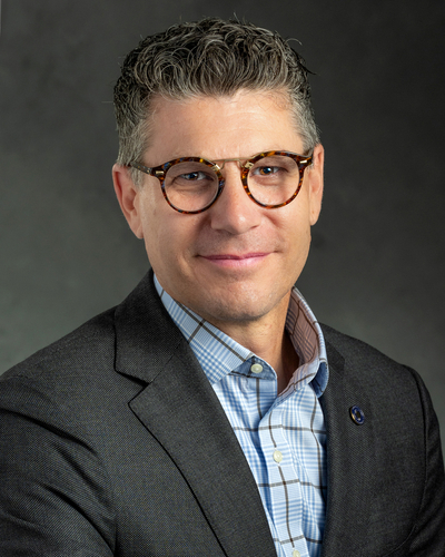 Headshot of Devon Akmon