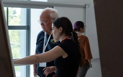 Joseph Krajcik with a student.