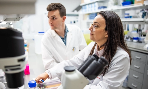 Two scientists working in a lab